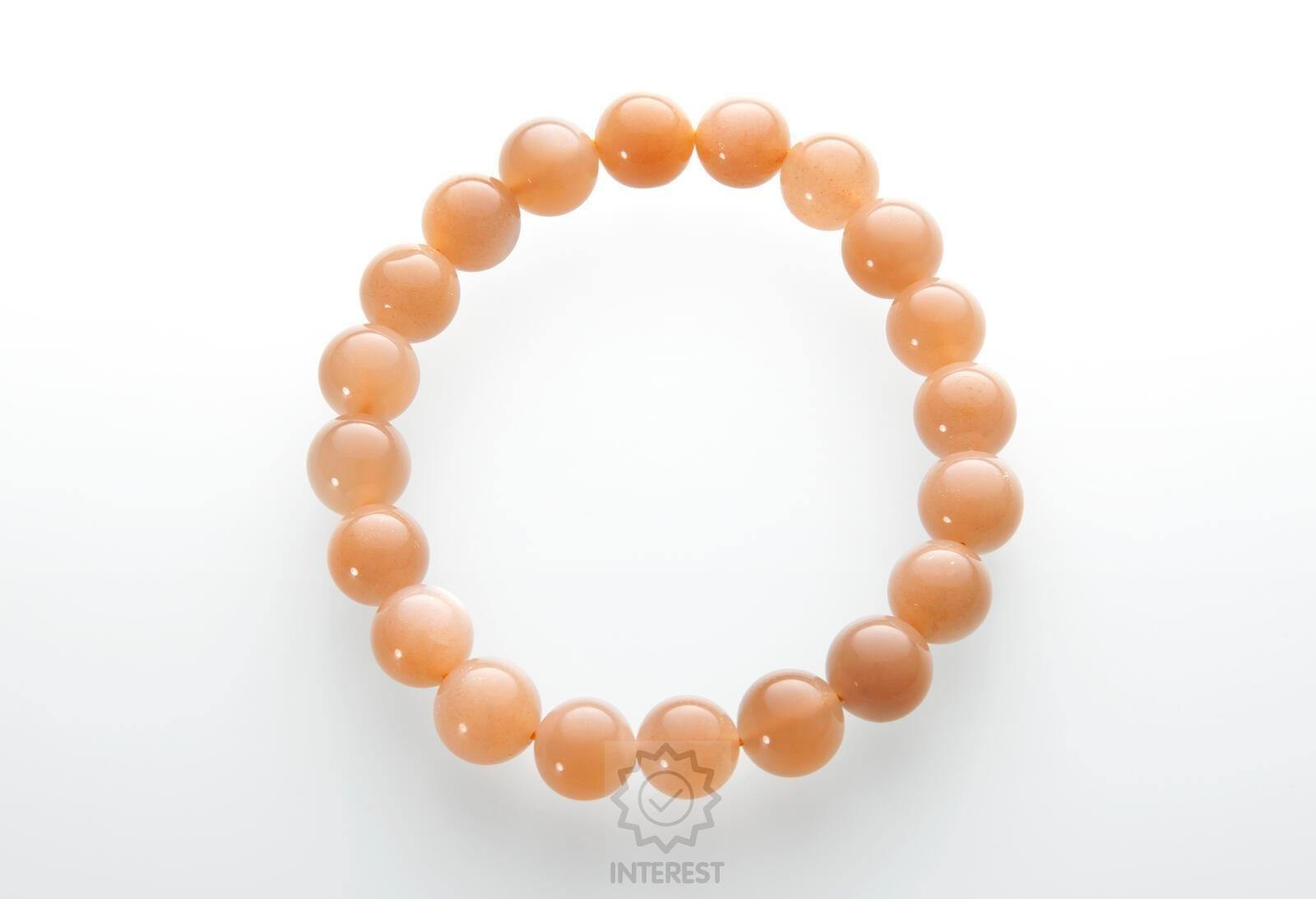 Náramek - Měsíční kámen oranžový kulička 10 mm.